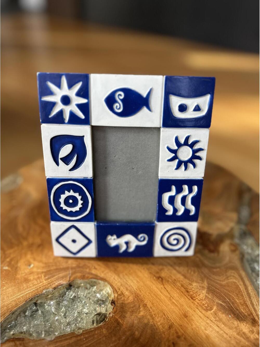 Decorative Photo Frame with Blue and White Symbols